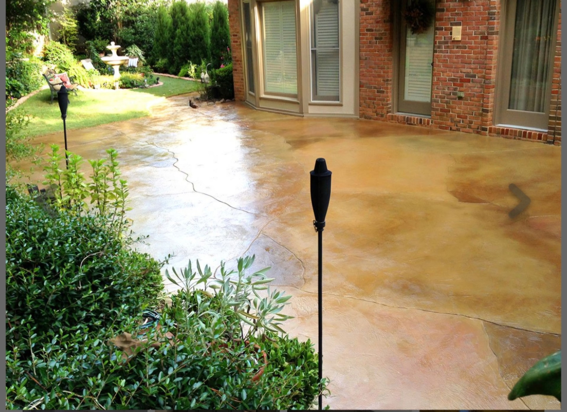 Amber Acrylistain finish on a stamped concrete patio